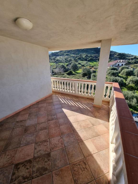 a view from the balcony of a house at I giardini del castello in Mandatoriccio Marina
