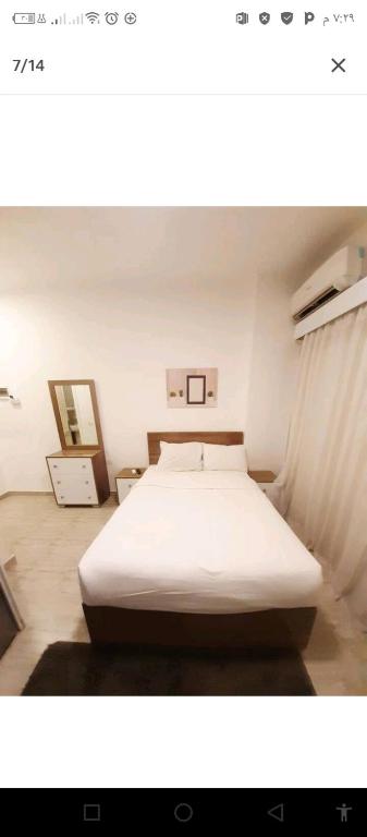 Postel nebo postele na pokoji v ubytování One bedroom apartment in Aqua palm resort before Al Gouna