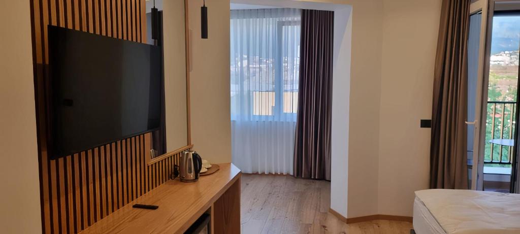 TV a/nebo společenská místnost v ubytování SIBB Hotel
