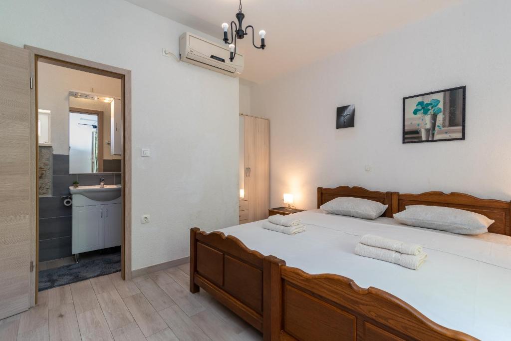 Postel nebo postele na pokoji v ubytování Filomena Rooms