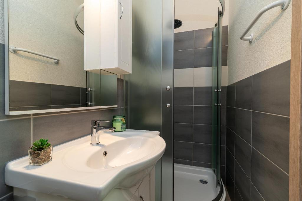 Koupelna v ubytování Filomena Rooms