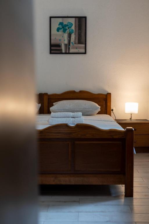 Postel nebo postele na pokoji v ubytování Filomena Rooms