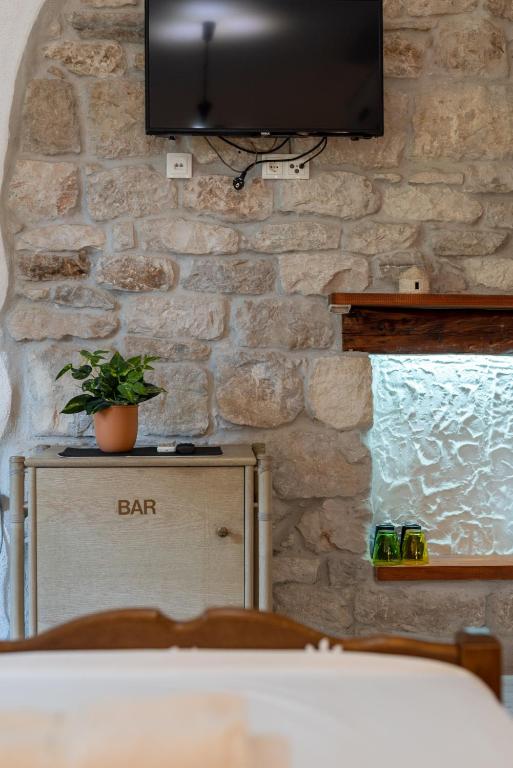 Postel nebo postele na pokoji v ubytování Filomena Rooms