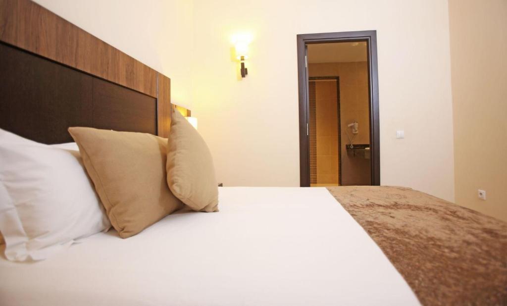 Postel nebo postele na pokoji v ubytování Labranda Targa Aqua Parc