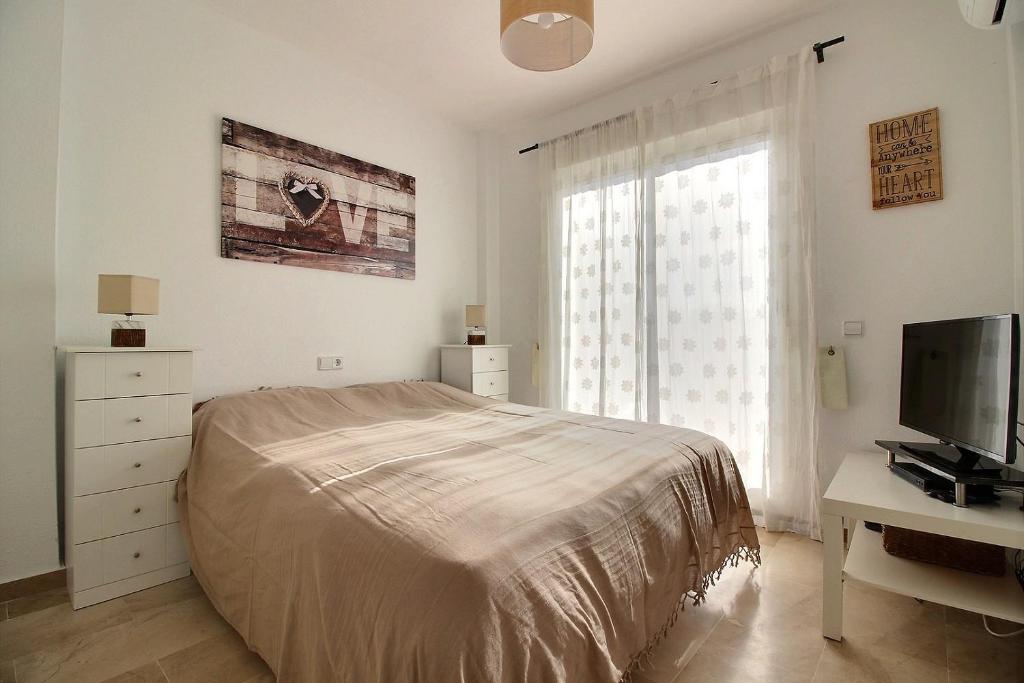Telewizja i/lub zestaw kina domowego w obiekcie 2231 - Amazing 3 bedrooms with 3 sunny terraces
