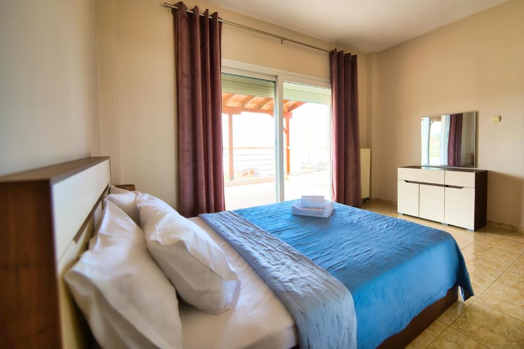 Posteľ alebo postele v izbe v ubytovaní Anelia Villas Sea View