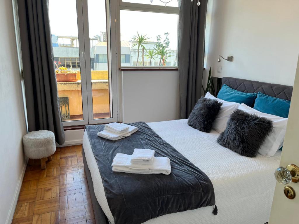 Postel nebo postele na pokoji v ubytování Apartamento Trindade