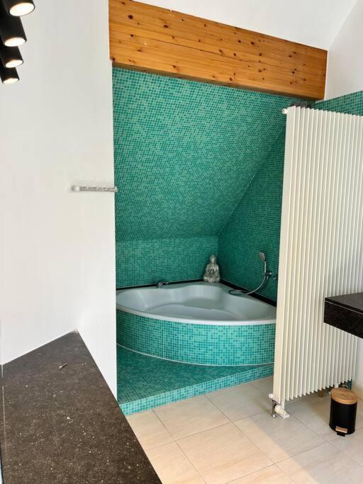 Postel nebo postele na pokoji v ubytování House Botanique