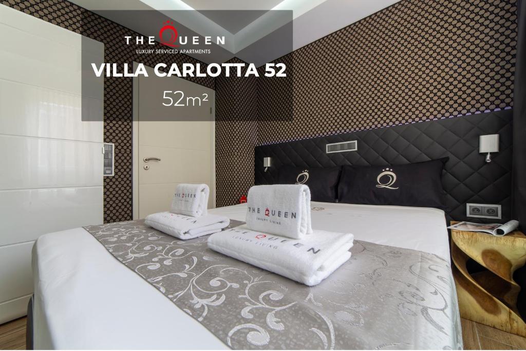 Postel nebo postele na pokoji v ubytování The Queen Luxury Apartments - Villa Carlotta