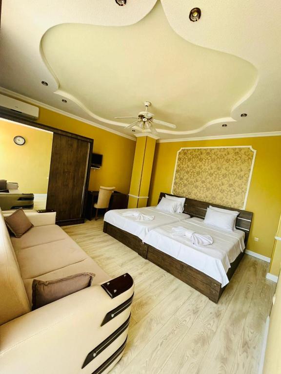 Postel nebo postele na pokoji v ubytování Hotel Albatros