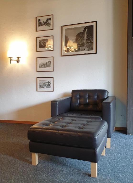 Uma área de estar em Hotel Jungfrau Mürren