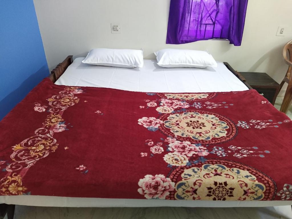 Postel nebo postele na pokoji v ubytování SARA Beach House