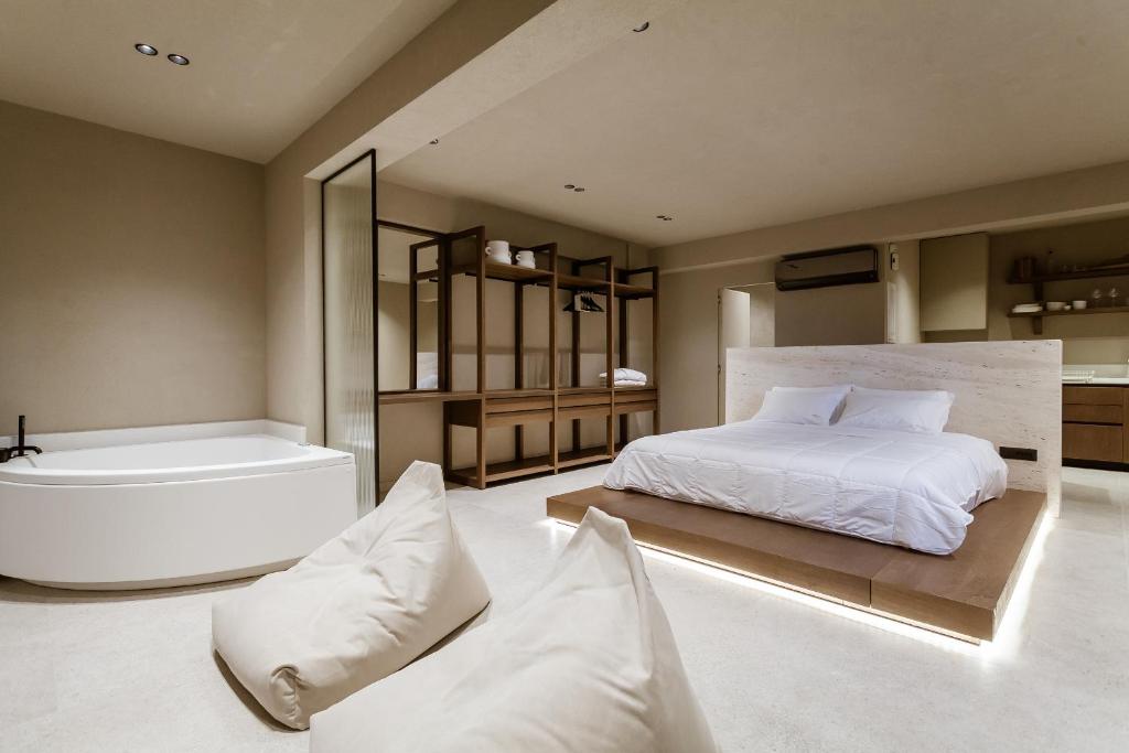 Voodi või voodid majutusasutuse Sevasti Seaview Suite toas
