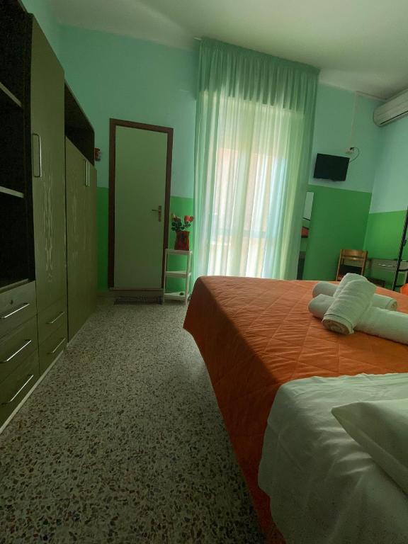 Postel nebo postele na pokoji v ubytování Hotel Acapulco sul mare