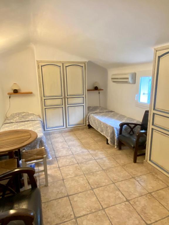 Postel nebo postele na pokoji v ubytování Residence ISULA DI I CORSI