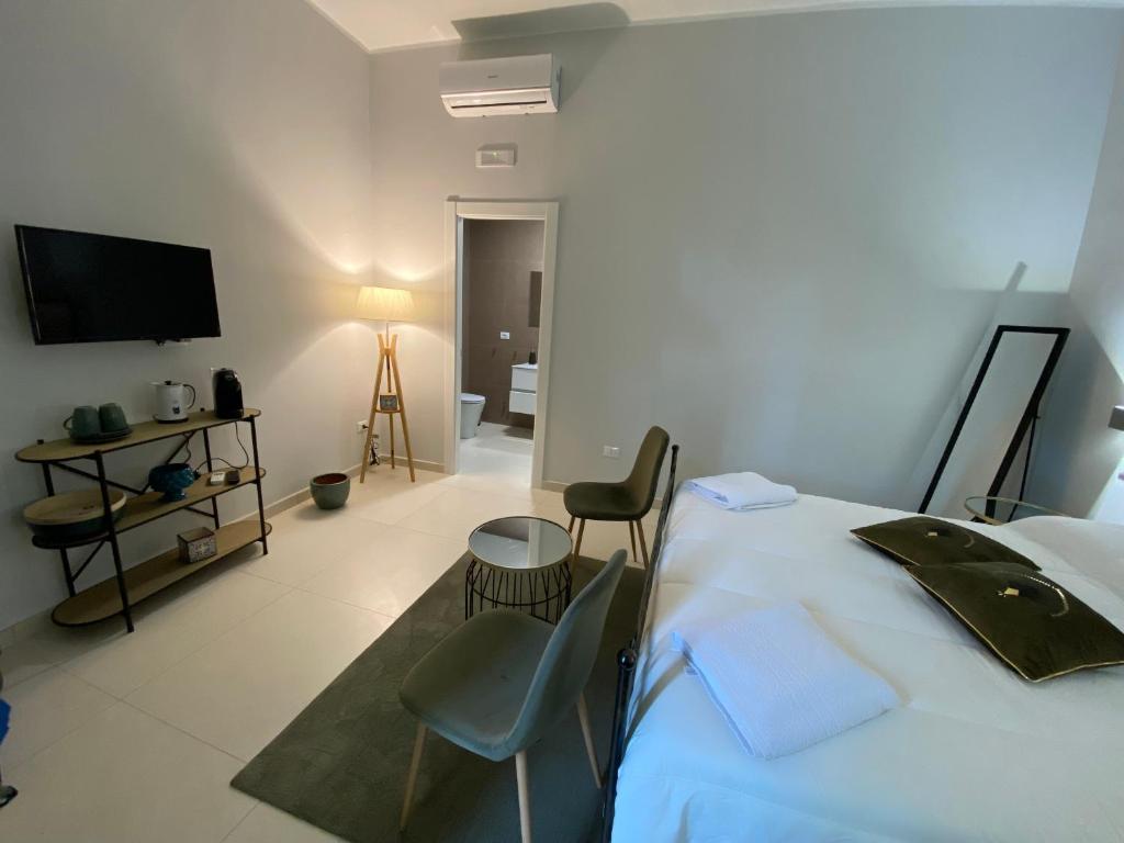 TV a/nebo společenská místnost v ubytování Pummarella b&b