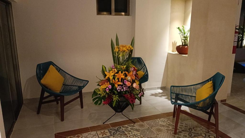 Posezení v ubytování Hotel Yaxactun