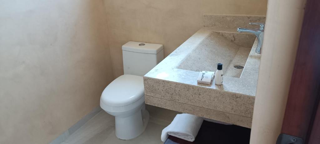 Koupelna v ubytování Hotel Yaxactun