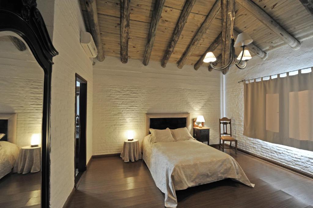 Un ou plusieurs lits dans un hébergement de l'établissement Estancia turistica La amorosa