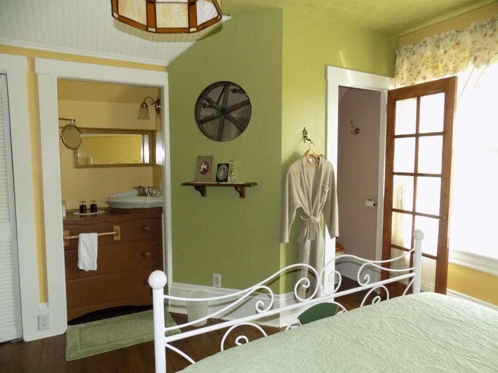 Postel nebo postele na pokoji v ubytování À L'Ancestrale B&B
