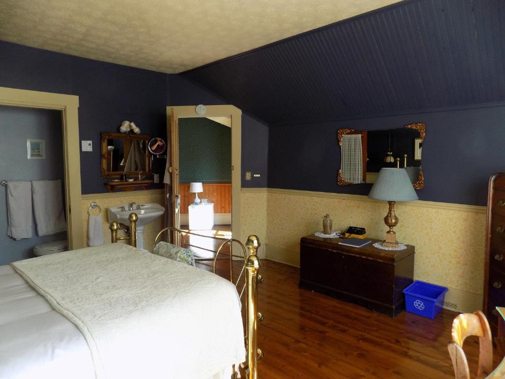 Postel nebo postele na pokoji v ubytování À L'Ancestrale B&B
