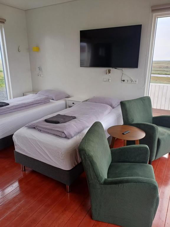 Postel nebo postele na pokoji v ubytování Grímstunga Guesthouse Hólsfjöll