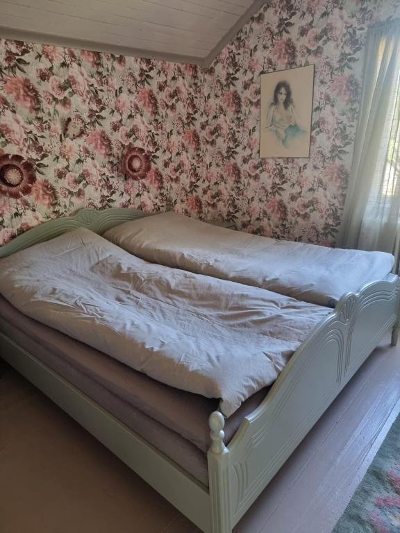 Postel nebo postele na pokoji v ubytování Gamla Kooperativa