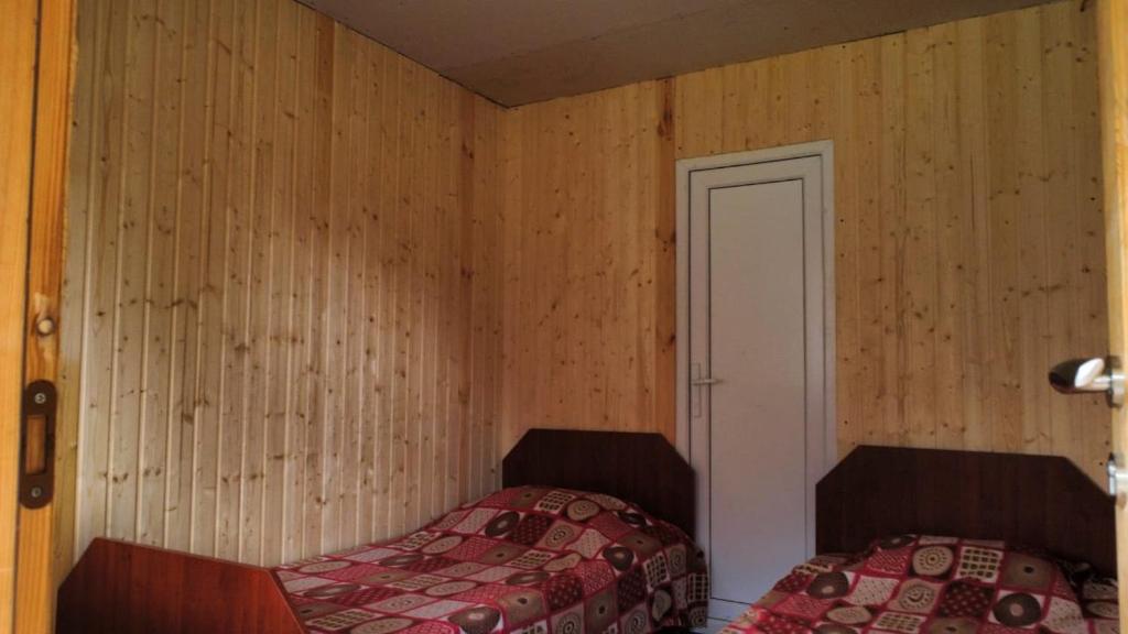 Postel nebo postele na pokoji v ubytování Guesthouse Everest