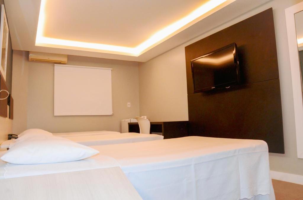 TV a/nebo společenská místnost v ubytování Hotel São Domingos