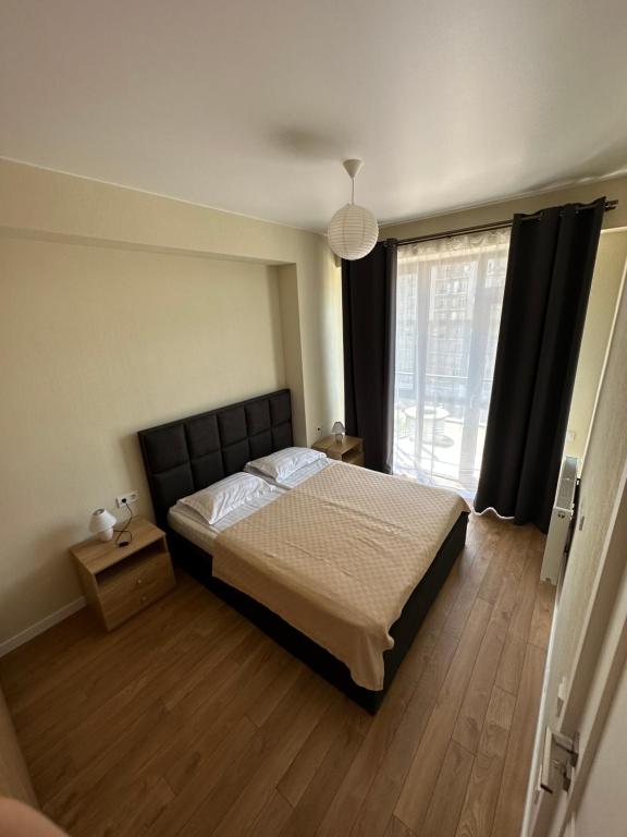 Katil atau katil-katil dalam bilik di Orexus Tower Apartment in center of Tbilisi