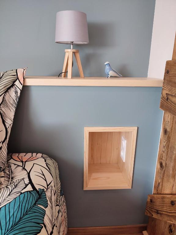Postel nebo postele na pokoji v ubytování Le Grenier - Chambre d'hôtes