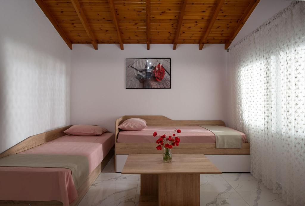 Postel nebo postele na pokoji v ubytování ViLLA DRAGANI