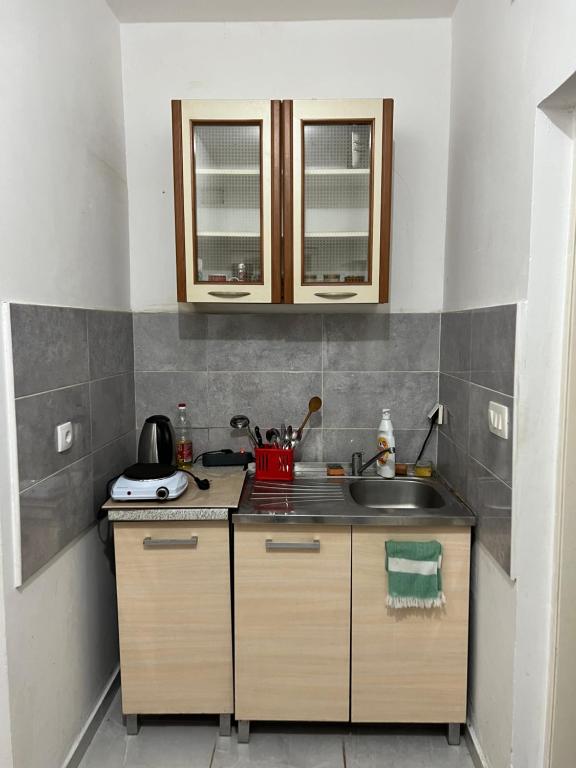 Kuchyň nebo kuchyňský kout v ubytování Green Villa
