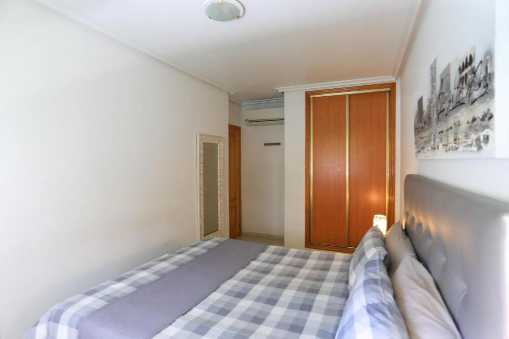 Postel nebo postele na pokoji v ubytování Cabo Roig La Rotonda, Pool, Beach & Comfort