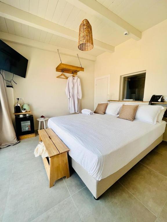 Postel nebo postele na pokoji v ubytování Palazzo Matà Boutique Hotel