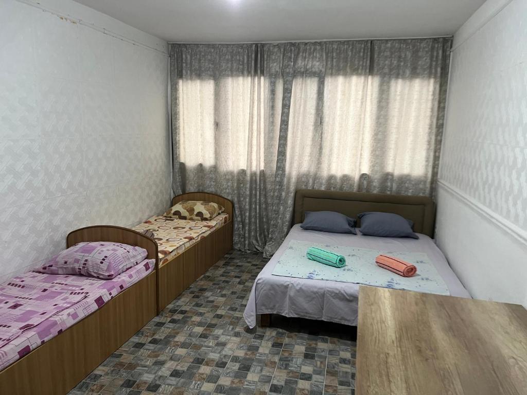 Postel nebo postele na pokoji v ubytování Green Villa