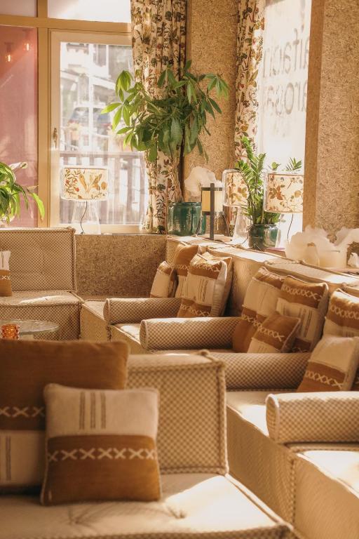 Posezení v ubytování Pension Arosa - Self Check-In