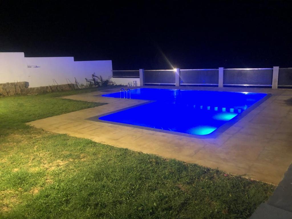 Bazén v ubytování Villa Le Pacha Assilah nebo v jeho okolí