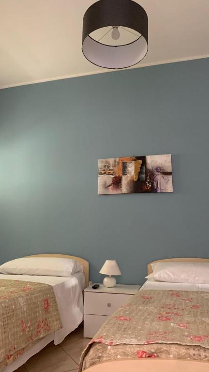 Postel nebo postele na pokoji v ubytování Mirage B&B