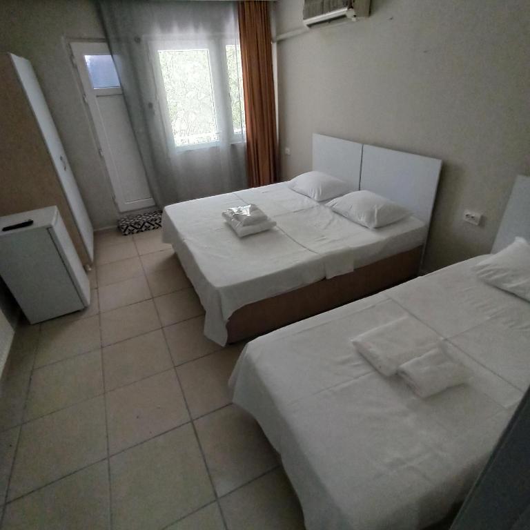Nilhan Otel - Dreifacher Raum