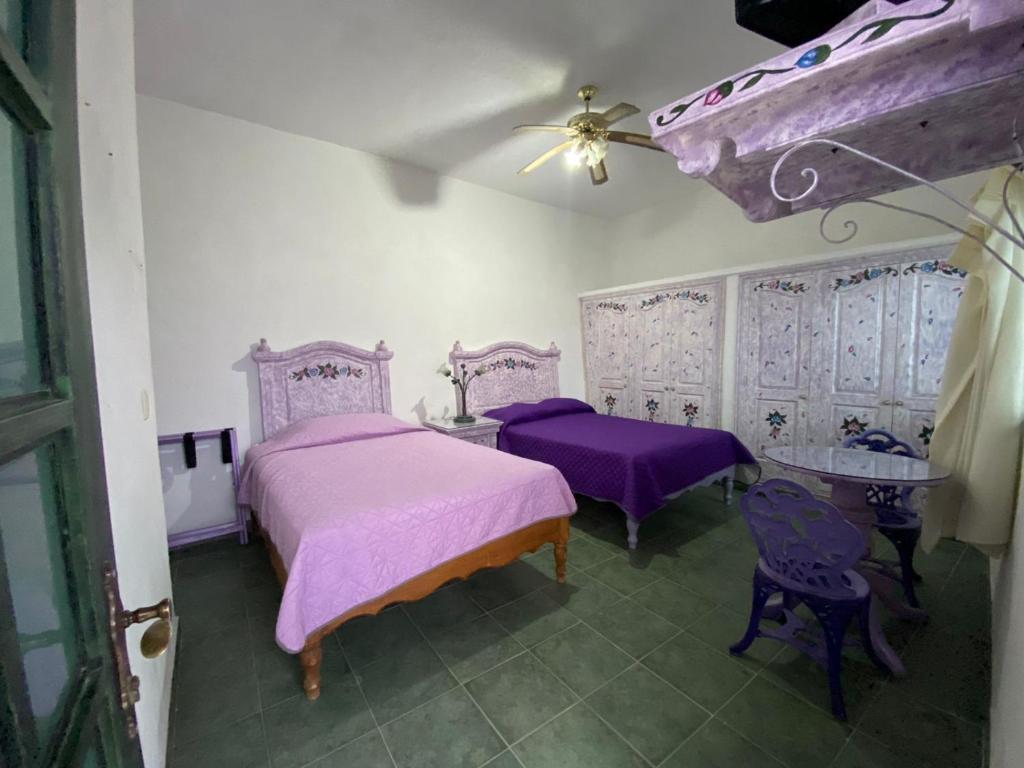 Postel nebo postele na pokoji v ubytování Casa Morada