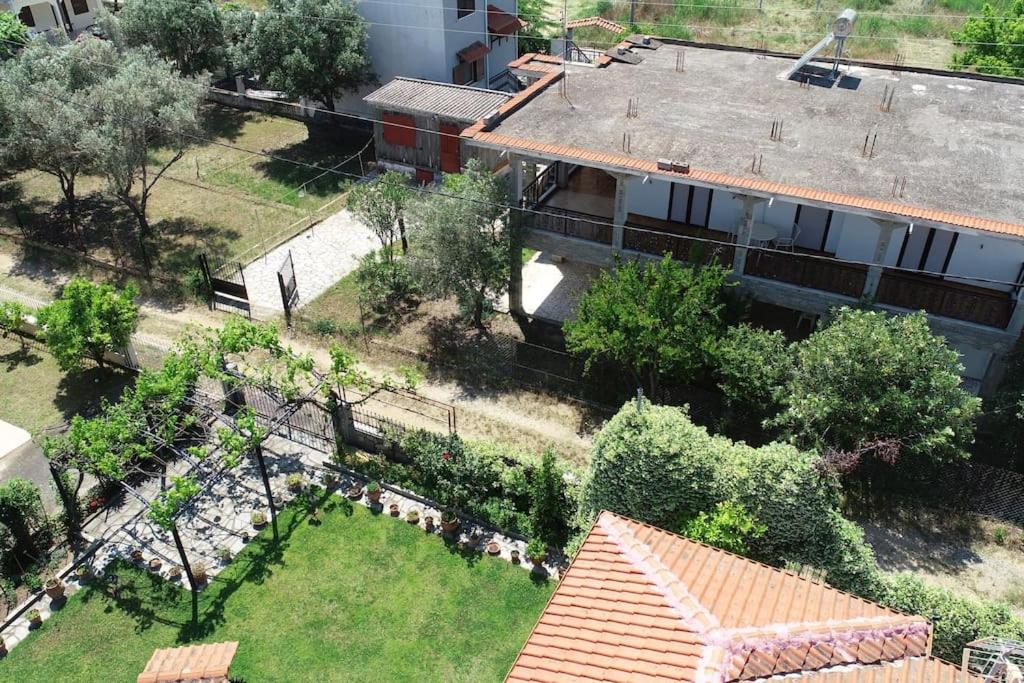 an aerial view of a house and a yard at Vrea Home in Nea Vrasna