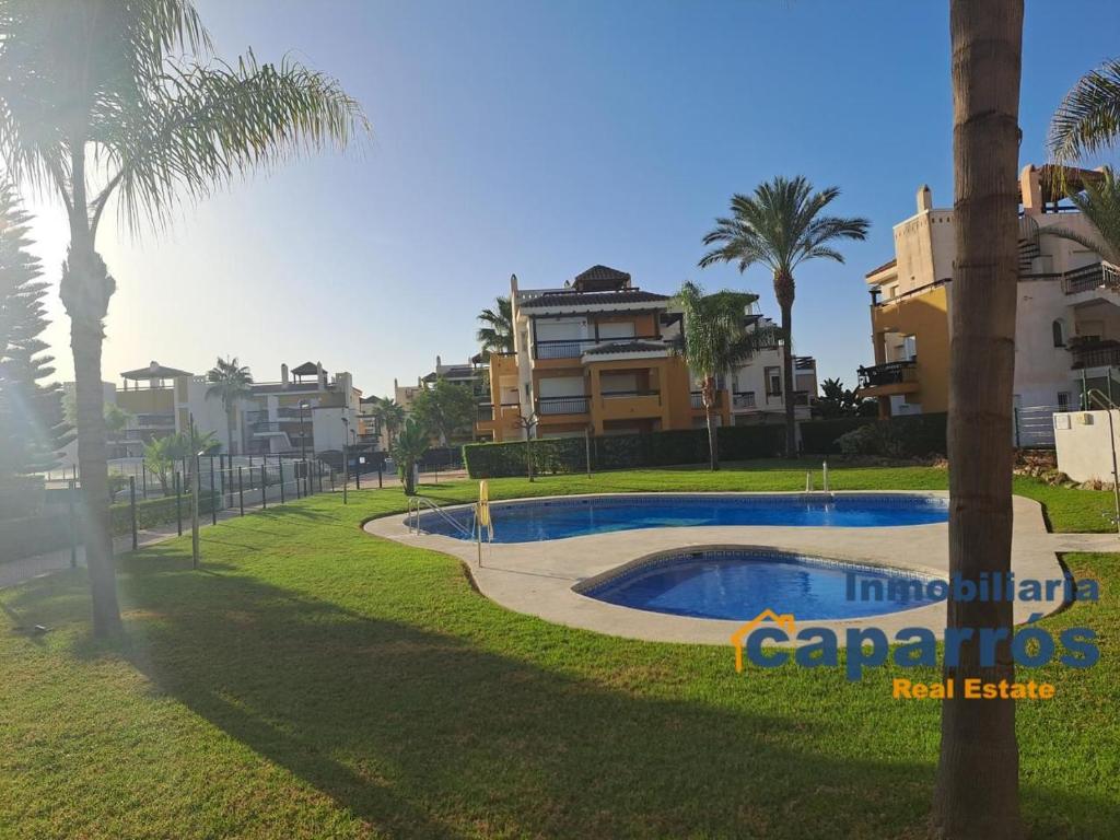 Bazén v ubytovaní Ático Lomas del Mar 1 - Vera Playa alebo v jeho blízkosti