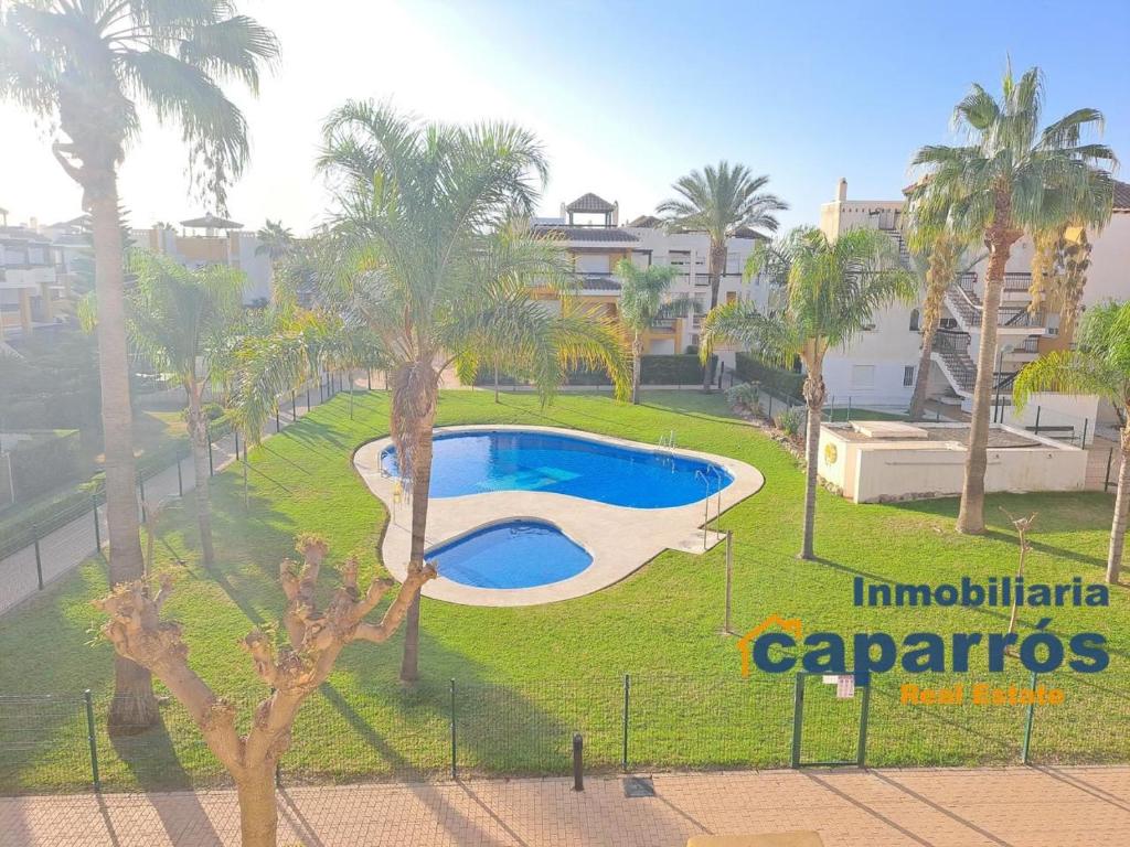 Bazén v ubytovaní Ático Lomas del Mar 1 - Vera Playa alebo v jeho blízkosti