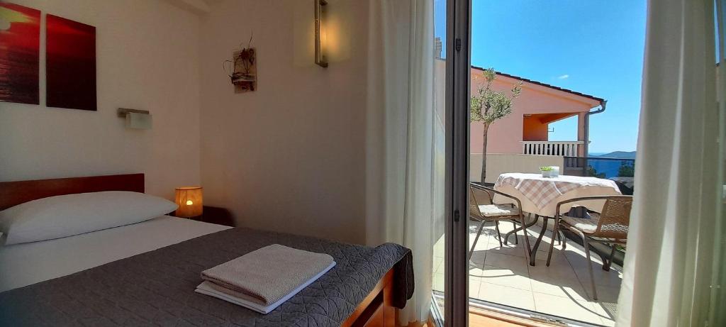 Posteľ alebo postele v izbe v ubytovaní Apartment Sea View