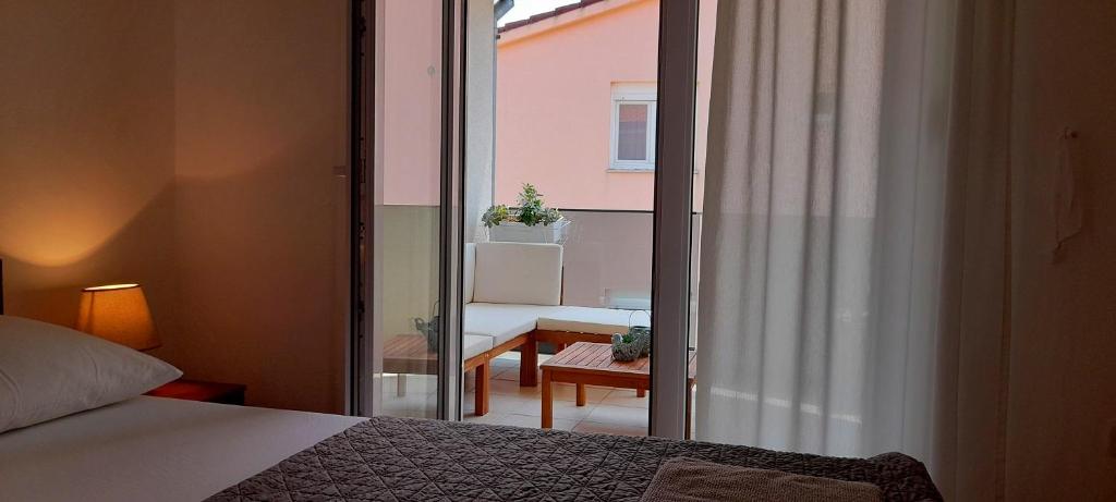 Posteľ alebo postele v izbe v ubytovaní Apartment Sea View