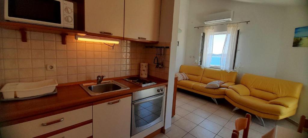 Kuchyňa alebo kuchynka v ubytovaní Apartment Sea View