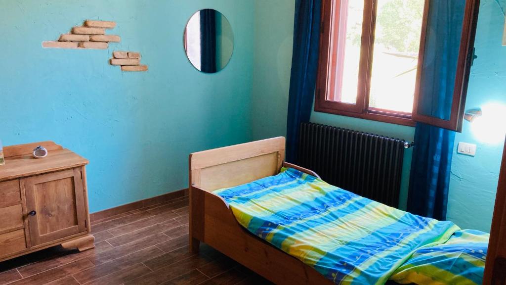 Postel nebo postele na pokoji v ubytování Il Rustico
