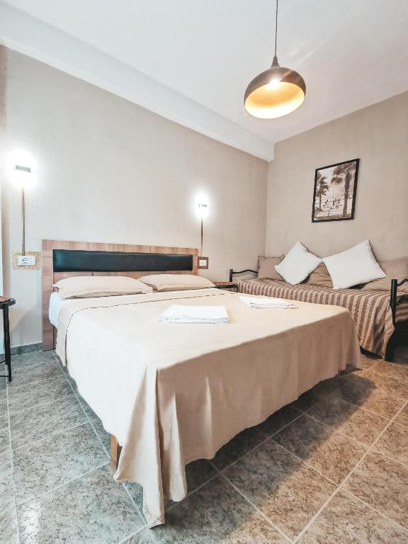 Postel nebo postele na pokoji v ubytování Arda Beachside Living