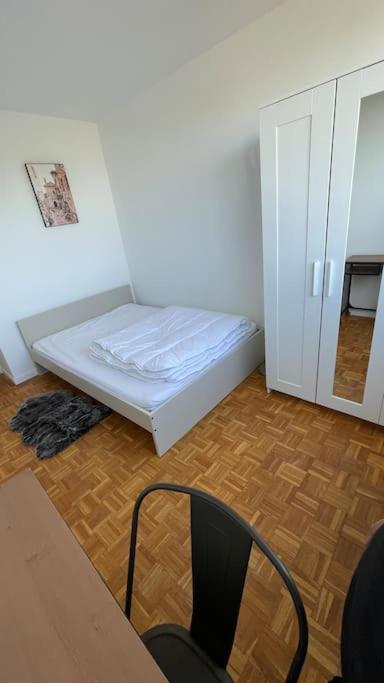 Una cama o camas en una habitaci&oacute;n de 30 min de Paris Grand appartement neuf et lumineux